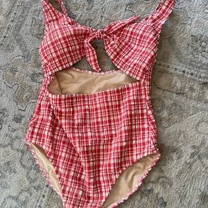 checkered pinkish red one piece bathing suit